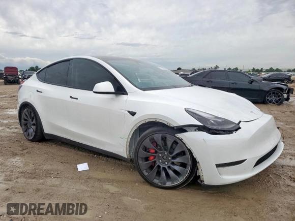 2024 Tesla Model Y Performance z VIN 7SAYGDEF0RA266605, wystawiony jako Copart lot #57820905 z przebiegiem Nie podano mil oraz Szkoda całkowita • Salvage title. Historia ofert i sprzedaży dostępna na DreamBid. Obrazek 4.