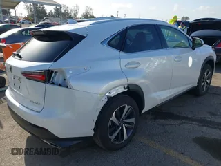 2021 Lexus NX with VIN JTJGARBZXM5023867, listed as a IAAI auction lot 41916734 with 26,675 mi miles. Bid and sale history available at carsss.com. Image 4.