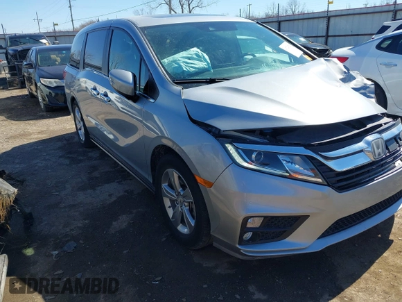 2018 Honda Odyssey EX-L with VIN 5FNRL6H71JB077112, listed as a IAAI auction lot 41721523 with 70,893 mi miles. Bid and sale history available at carsss.com. Image 1.