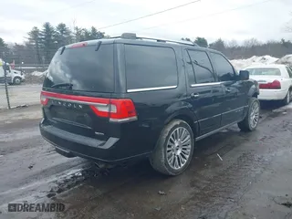 2015 Lincoln Navigator with VIN 5LMJJ2JT6FEJ09931, listed as a IAAI auction lot 41709770 with 137,674 mi miles. Bid and sale history available at carsss.com. Image 4.