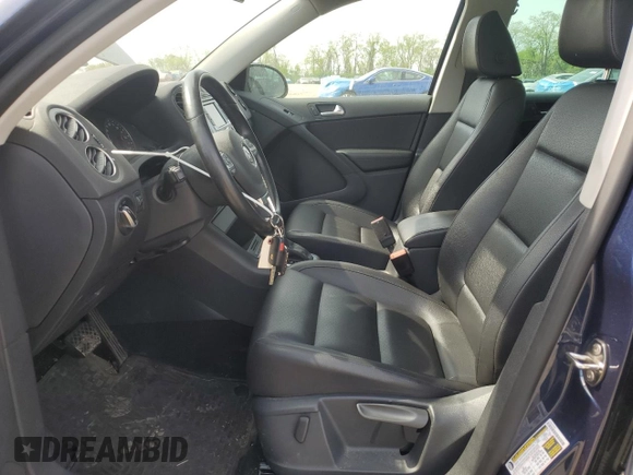 2012 Volkswagen Tiguan S with VIN WVGBV7AX1CW561870, listed as a Copart auction lot 53932255 with 105,972 mi miles and Salvage Title. Bid and sale history available at DreamBid. Image 7.