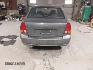 2004 Hyundai Accent GL with VIN KMHCG45C44U528783, listed as a IAAI auction lot 41535104 with 1 mi miles. Bid and sale history available at carsss.com. Image 16.