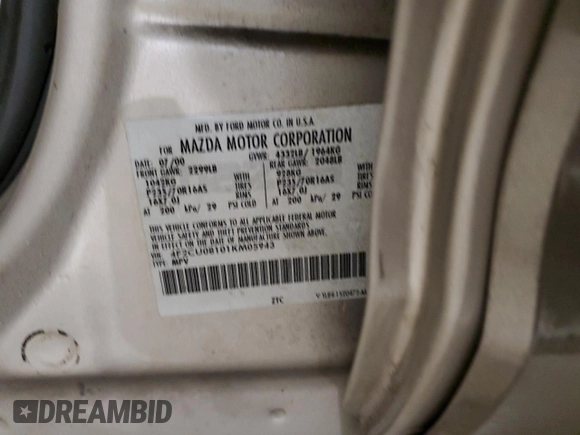 2001 Mazda Tribute LX with VIN 4F2CU08101KM05943, listed as a Copart auction lot 84077694 with 137,937 mi miles and Salvage Title. Bid and sale history available at DreamBid. Image 13.