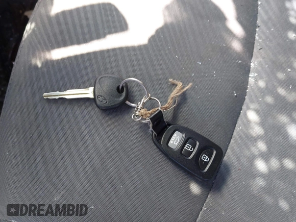 2013 Hyundai Elantra Limited z VIN 5NPDH4AE6DH209246, wystawiony jako IAAI lot #41999702 z przebiegiem 132 786 mil mil oraz . Historia ofert i sprzedaży dostępna na DreamBid. Obrazek 11.