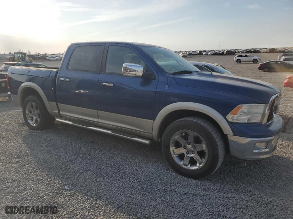 2009 Dodge Ram 1500 Laramie with VIN 1D3HB13T89J521779, listed as a Copart auction lot 48239135 with 144,414 mi miles and Salvage Title. Bid and sale history available at carsss.com. Image 4.