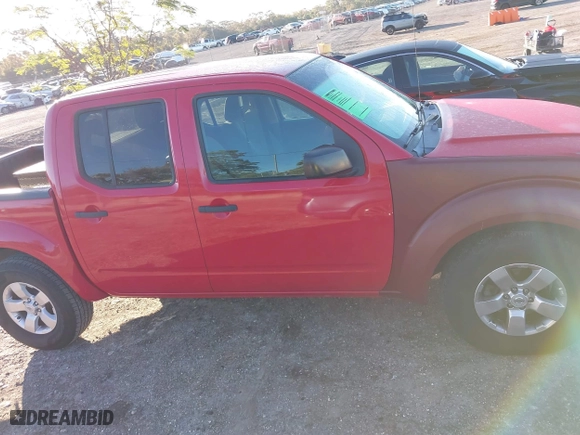 2009 Nissan Frontier SE with VIN 1N6AD07U19C419811, listed as a IAAI auction lot 41090904 with 141,119 mi miles. Bid and sale history available at carsss.com. Image 13.