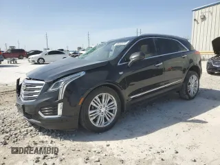 2018 Cadillac XT5 Premium Luxury FWD z VIN 1GYKNERS4JZ231745, wystawiony jako Copart lot #49650875 z przebiegiem 121 679 mil mil oraz Szkody całkowita. Historia ofert i sprzedaży dostępna na DreamBid. Obrazek 1.