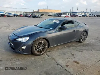 2016 Scion FR-S z VIN JF1ZNAA1XG8709638, wystawiony jako Copart lot #59103905 z przebiegiem 51 987 mil mil oraz Szkoda całkowita • Salvage title. Historia ofert i sprzedaży dostępna na DreamBid. Obrazek 1.