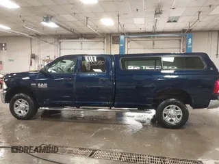 2015 Ram 2500 Tradesman z VIN 3C6TR5HTXFG605539, wystawiony jako IAAI lot #41833380 z przebiegiem 103 921 mil mil oraz . Historia ofert i sprzedaży dostępna na DreamBid. Obrazek 14.