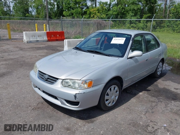 2002 Toyota Corolla CE with VIN 1NXBR12E12Z581660, listed as a IAAI auction lot 42654124 with 115,950 mi miles and . Bid and sale history available at DreamBid. Image 2.