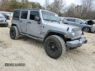 2015 Jeep Wrangler Unlimited Willys Wheeler with VIN 1C4BJWDG4FL723924, listed as a Copart auction lot 47145245 with 166,256 mi miles and Salvage Title. Bid and sale history available at DreamBid. Image 4.