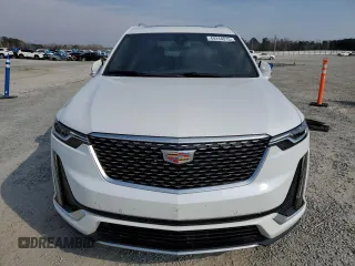 2024 Cadillac XT6 FWD Luxury z VIN 1GYKPAR47RZ705252, wystawiony jako Copart lot #49244015 z przebiegiem 26 838 mil mil oraz Szkody całkowita. Historia ofert i sprzedaży dostępna na DreamBid. Obrazek 5.