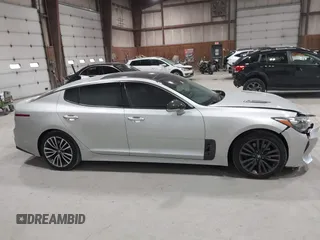 2018 Kia Stinger Premium with VIN KNAE25LA6J6021819, listed as a IAAI auction lot 41880827 with 119,214 mi miles. Bid and sale history available at carsss.com. Image 13.