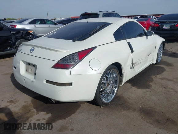 2004 Nissan 350Z Touring with VIN JN1AZ34D14M102966, listed as a IAAI auction lot 41921270 with 182,633 mi miles. Bid and sale history available at carsss.com. Image 4.