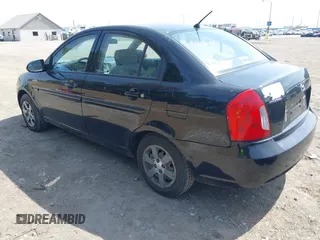 2006 Hyundai Accent GLS with VIN KMHCN46C36U018237, listed as a IAAI auction lot 41916524 with 92,427 mi miles. Bid and sale history available at carsss.com. Image 3.