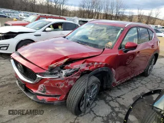 2021 Mazda CX-5 Signature with VIN JM3KFBEY2M0351720, listed as a Copart auction lot 79309063 with 21,349 mi miles and Salvage Title. Bid and sale history available at carsss.com. Image 1.