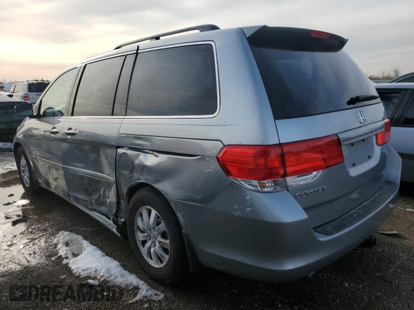 2010 Honda Odyssey EX-L with VIN 5FNRL3H69AB001952, listed as a Copart auction lot 49738155 with 95,721 mi miles and Salvage Title. Bid and sale history available at carsss.com. Image 2.