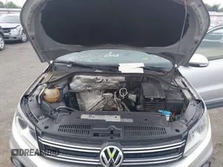 2012 Volkswagen Tiguan SE z VIN WVGAV7AX4CW520340, wystawiony jako IAAI lot #42294414 z przebiegiem 120 009 mil mil oraz . Historia ofert i sprzedaży dostępna na DreamBid. Obrazek 10.