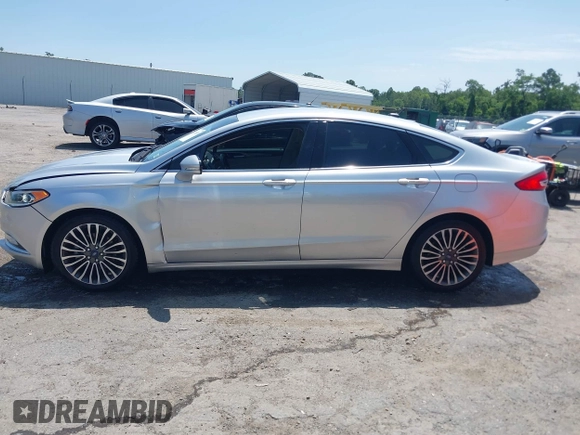 2017 Ford Fusion SE with VIN 3FA6P0HDXHR372203, listed as a IAAI auction lot 42392330 with 172,266 mi miles and . Bid and sale history available at DreamBid. Image 14.