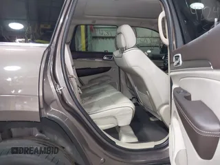 2020 Jeep Grand Cherokee Summit with VIN 1C4RJFJG1LC170714, listed as a IAAI auction lot 42247702 with 78,614 mi miles and . Bid and sale history available at DreamBid. Image 8.