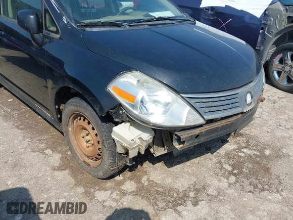 2009 Nissan Versa 1.8 S with VIN 3N1BC13E59L499006, listed as a IAAI auction lot 41953194 with 179,330 mi miles. Bid and sale history available at carsss.com. Image 1.