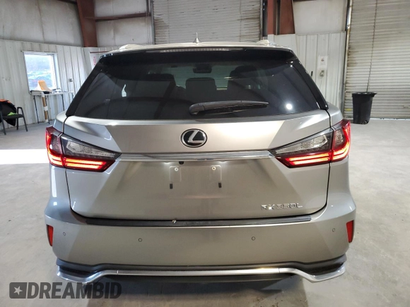 2020 Lexus RX 350L with VIN JTJHZKFA7L2024953, listed as a Copart auction lot 85044234 with 60,874 mi miles and Salvage title. Bid and sale history available at DreamBid. Image 6.