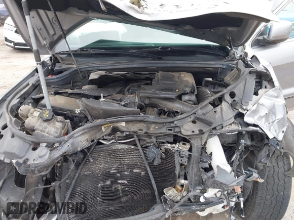 2018 Jeep Grand Cherokee Laredo z VIN 1C4RJFAG0JC129021, wystawiony jako IAAI lot #42413165 z przebiegiem 103 743 mil mil oraz . Historia ofert i sprzedaży dostępna na DreamBid. Obrazek 9.