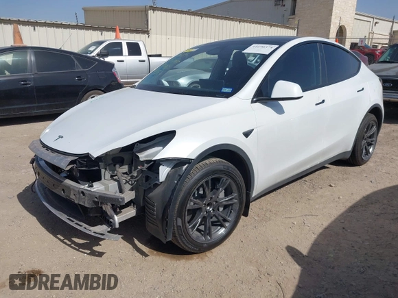 2024 Tesla Model Y with VIN 7SAYGDEDXRA300743, listed as a IAAI auction lot 41690374 with 12,446 mi miles and . Bid and sale history available at DreamBid. Image 23.