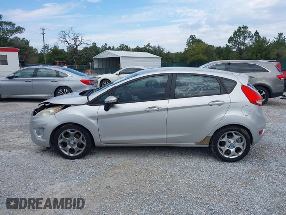 2011 Ford Fiesta SES with VIN 3FADP4FJ5BM232264, listed as a IAAI auction lot 40982622 with 184,726 mi miles. Bid and sale history available at carsss.com. Image 14.