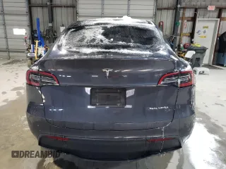 2023 Tesla Model Y Long Range z VIN 7SAYGAEE3PF968231, wystawiony jako Copart lot #45811385 z przebiegiem Nie podano mil oraz Szkoda całkowita • Salvage title. Historia ofert i sprzedaży dostępna na DreamBid. Obrazek 6.