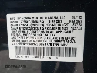 2012 Honda Pilot Touring z VIN 5FNYF4H92CB074778, wystawiony jako IAAI lot #42267913 z przebiegiem 138 362 mil mil oraz . Historia ofert i sprzedaży dostępna na DreamBid. Obrazek 9.