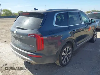 2020 Kia Telluride S with VIN 5XYP64HCXLG008043, listed as a IAAI auction lot 41808448 with 89,658 mi miles and . Bid and sale history available at carsss.com. Image 4.