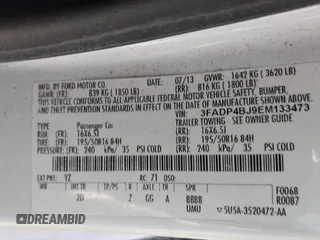 2014 Ford Fiesta SE with VIN 3FADP4BJ9EM133473, listed as a IAAI auction lot 42118460 with 107,705 mi miles and . Bid and sale history available at DreamBid. Image 9.