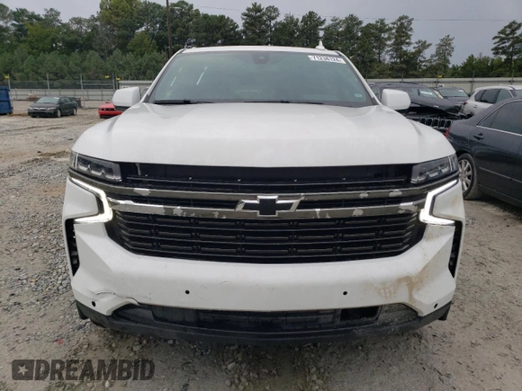 2021 Chevrolet Suburban LS with VIN 1GNSCBKD5MR392512, listed as a Copart auction lot 71238124 with 77,775 mi miles and Salvage Title. Bid and sale history available at DreamBid. Image 5.