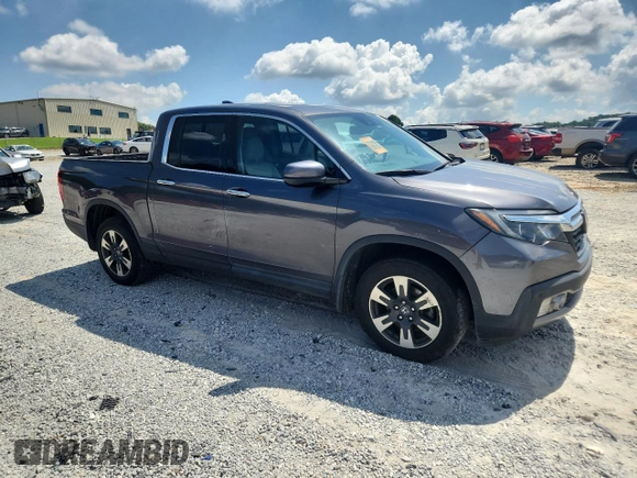 2017 Honda Ridgeline RTL-E with VIN 5FPYK3F79HB031142, listed as a Copart auction lot 62365885 with 134,517 mi miles and Salvage title. Bid and sale history available at DreamBid. Image 4.