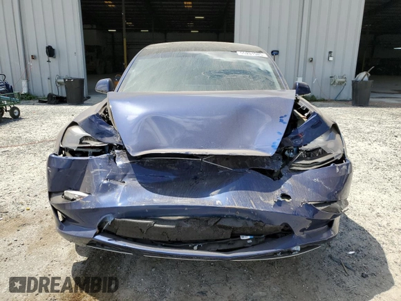 2023 Tesla Model 3 Performance z VIN 5YJ3E1EC4PF558646, wystawiony jako Copart lot #55201985 z przebiegiem 24 455 mil mil oraz Nie do naprawy • Non repairable. Historia ofert i sprzedaży dostępna na DreamBid. Obrazek 5.