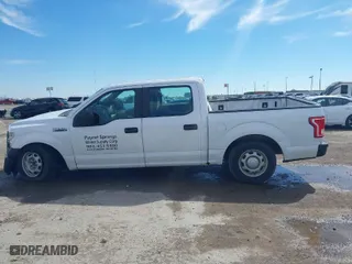 2015 Ford F-150 XL with VIN 1FTEW1CF5FKE60651, listed as a IAAI auction lot 41630778 with 150,815 mi miles. Bid and sale history available at carsss.com. Image 14.