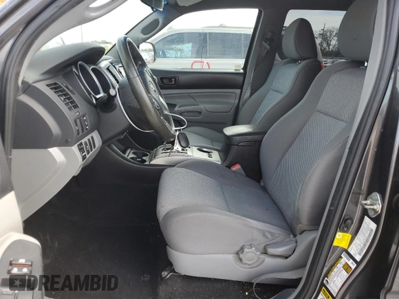 2014 Toyota Tacoma PreRunner with VIN 3TMKU4HN4EM040297, listed as a Copart auction lot 86418894 with 111,626 mi miles and Salvage title. Bid and sale history available at DreamBid. Image 7.