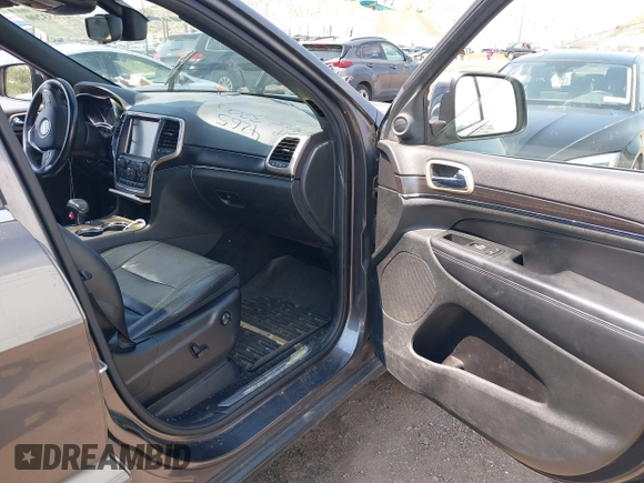 2014 Jeep Grand Cherokee Limited with VIN 1C4RJFBG1EC325215, listed as a IAAI auction lot 42653200 with 139,743 mi miles and . Bid and sale history available at DreamBid. Image 5.