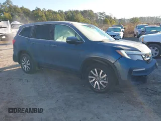 2021 Honda Pilot EX z VIN 5FNYF5H33MB004693, wystawiony jako IAAI lot #41304334 z przebiegiem 41 641 mil mil oraz . Historia ofert i sprzedaży dostępna na DreamBid. Obrazek 1.