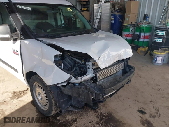 2019 Ram ProMaster City Cargo Tradesman z VIN ZFBHRFAB7K6M61484, wystawiony jako IAAI lot #41584872 z przebiegiem 63 558 mil mil oraz . Historia ofert i sprzedaży dostępna na DreamBid. Obrazek 6.
