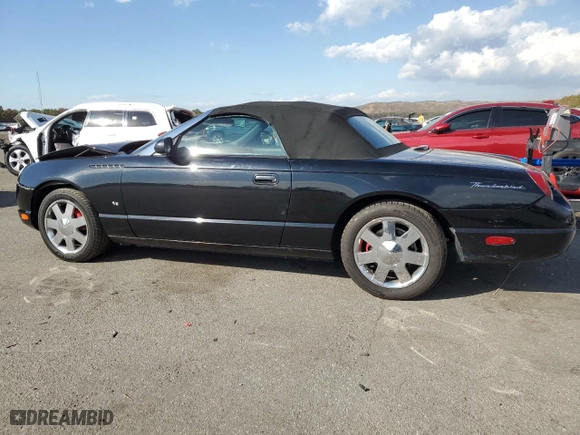 2003 Ford Thunderbird Deluxe with VIN 1FAHP60A63Y104093, listed as a Copart auction lot 76028744 with 79,995 mi miles and Salvage Title. Bid and sale history available at carsss.com. Image 2.