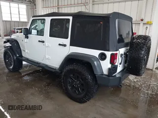 2016 Jeep Wrangler Unlimited Rubicon with VIN 1C4HJWFG4GL127379, listed as a IAAI auction lot 41732688 with 110,193 mi miles. Bid and sale history available at carsss.com. Image 3.