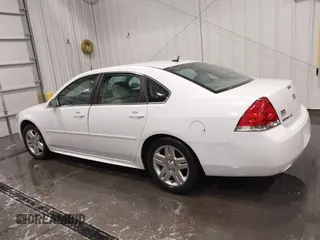 2014 Chevrolet Impala LT with VIN 2G1WB5E30E1140591, listed as a IAAI auction lot 41620447 with 186,226 mi miles and . Bid and sale history available at DreamBid. Image 14.
