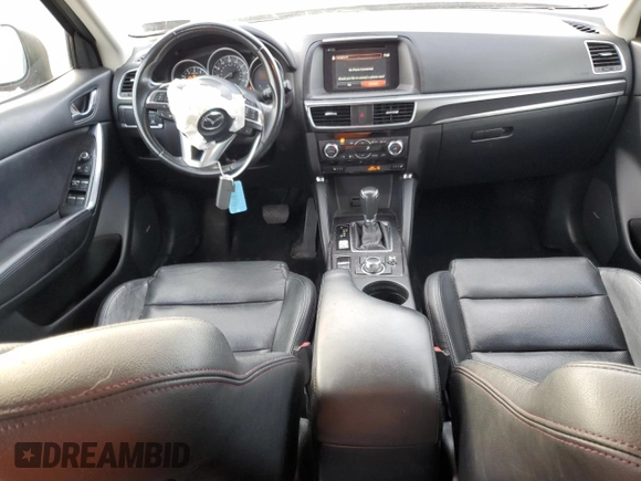 2016 Mazda CX-5 Grand Touring with VIN JM3KE4DY6G0753826, listed as a Copart auction lot 55391555 with 96,852 mi miles and Salvage Title. Bid and sale history available at DreamBid. Image 8.