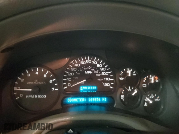 2002 Oldsmobile Bravada z VIN 1GHDT13S522107056, wystawiony jako Copart lot #86296454 z przebiegiem 169 856 mil mil oraz Tytuł czysty. Historia ofert i sprzedaży dostępna na DreamBid. Obrazek 9.