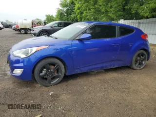 2013 Hyundai Veloster w/Red Int with VIN KMHTC6AD9DU148893, listed as a Copart auction lot 64975865 with 215,177 mi miles and Clean title. Bid and sale history available at DreamBid. Image 1.
