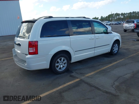 2010 Chrysler Town & Country Touring with VIN 2A4RR5DX4AR435106, listed as a IAAI auction lot 40726036 with 241,470 mi miles. Bid and sale history available at carsss.com. Image 4.