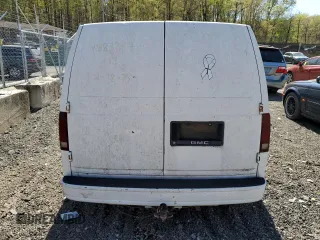 1989 GMC Safari z VIN 1GTCM15Z0KB507910, wystawiony jako Copart lot #53615555 z przebiegiem 64 389 mil mil oraz Szkody całkowita. Historia ofert i sprzedaży dostępna na DreamBid. Obrazek 6.