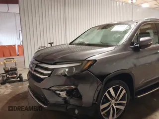 2017 Honda Pilot Touring with VIN 5FNYF6H91HB084737, listed as a IAAI auction lot 41608145 with 86,696 mi miles. Bid and sale history available at carsss.com. Image 6.